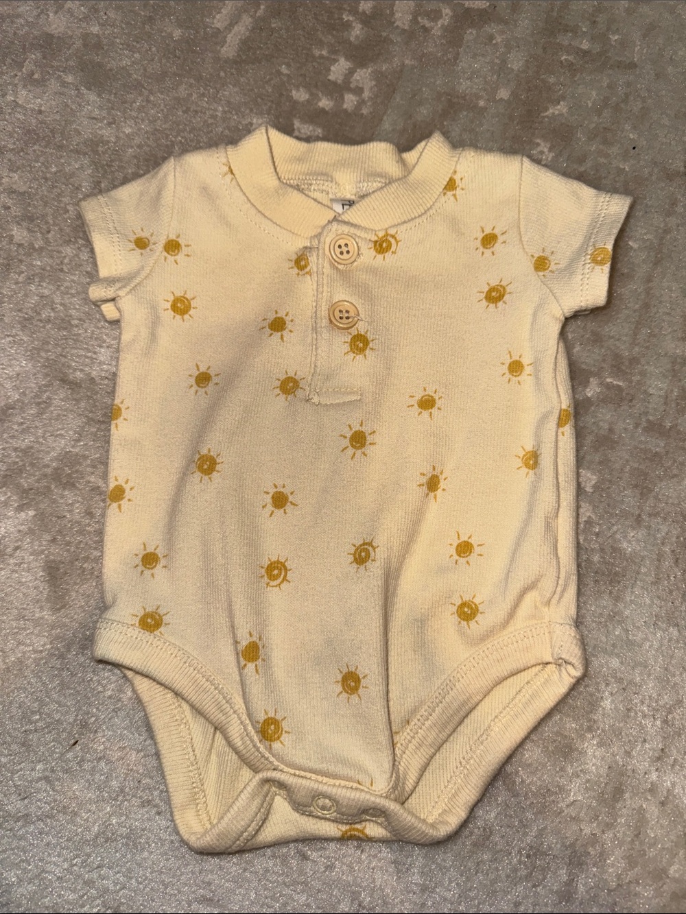 Cream Short-Sleeve Baby One-Piece with Yellow Sun Pattern